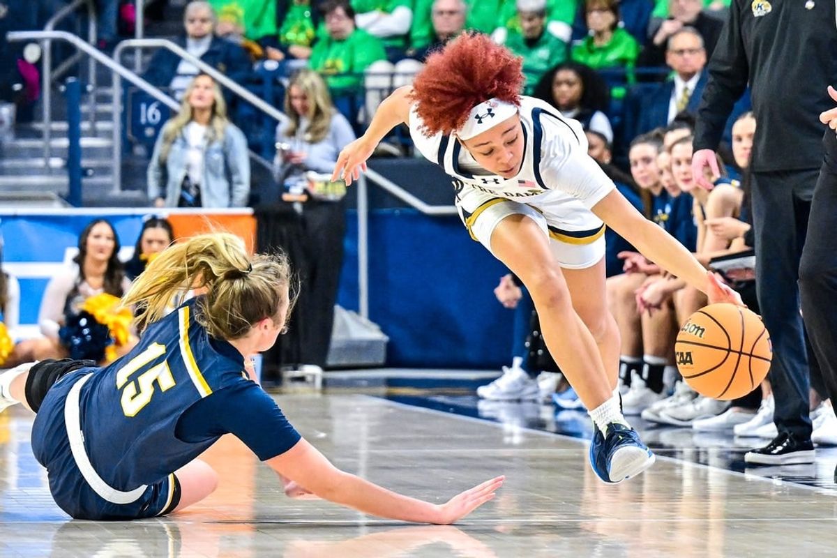 Mar 23, 2024; South Bend, Indiana, USA; Notre Dame Fighting Irish guard Hannah Hidalgo (3) steals the ball from Kent State Golden Flashes forward Bridget Dunn (15) in the second half at the Purcell Pavilion.