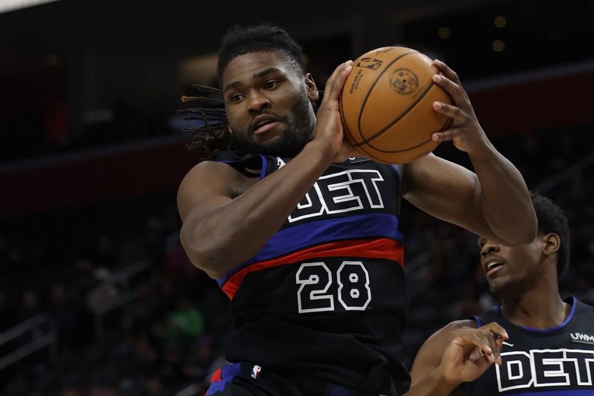 Jan 17, 2024; Detroit, Michigan, USA;  Detroit Pistons center Isaiah Stewart (28) grabs the rebound in the first half against the Minnesota Timberwolves at Little Caesars Arena.