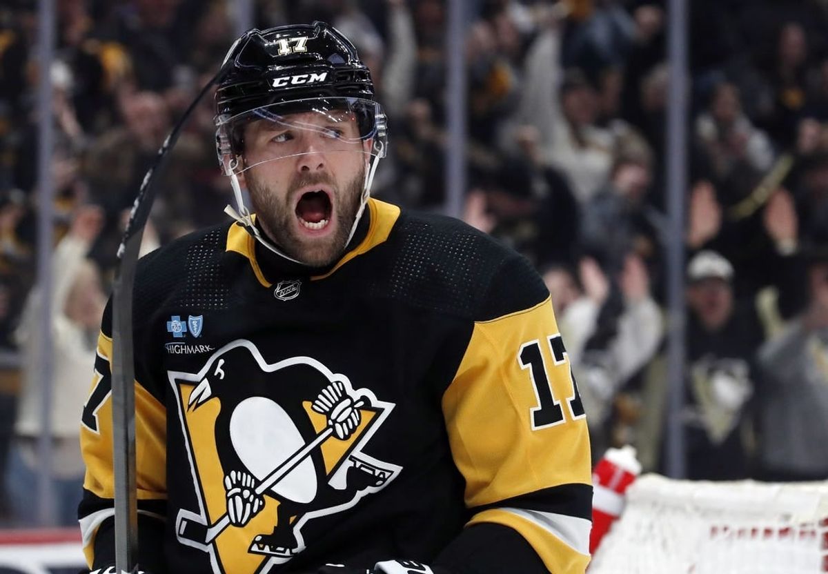 Feb 25, 2024; Pittsburgh, Pennsylvania, USA;  Pittsburgh Penguins right wing Bryan Rust (17) reacts after scoring his second goal of the game against the Philadelphia Flyers during the second period at PPG Paints Arena.