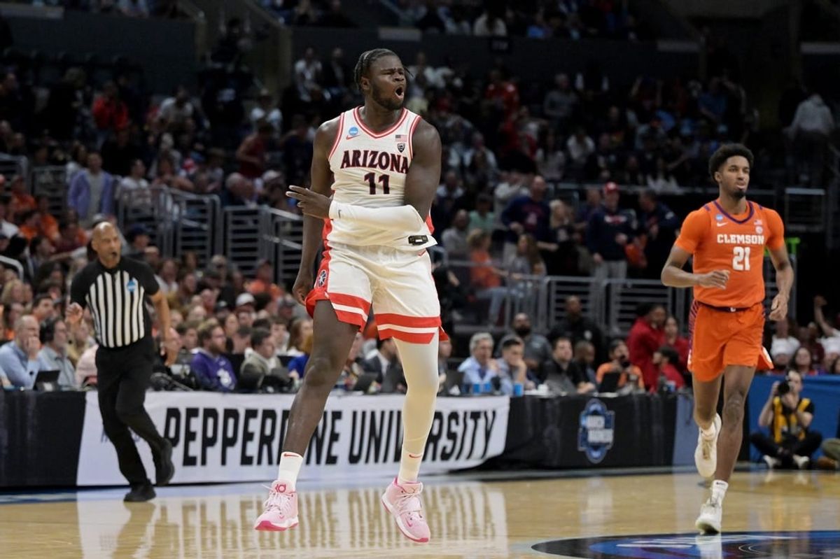 Mar 28, 2024; Los Angeles, CA, USA; Arizona Wildcats center Oumar Ballo (11) reacts in the first half against the Clemson Tigers in the semifinals of the West Regional of the 2024 NCAA Tournament at Crypto.com Arena.