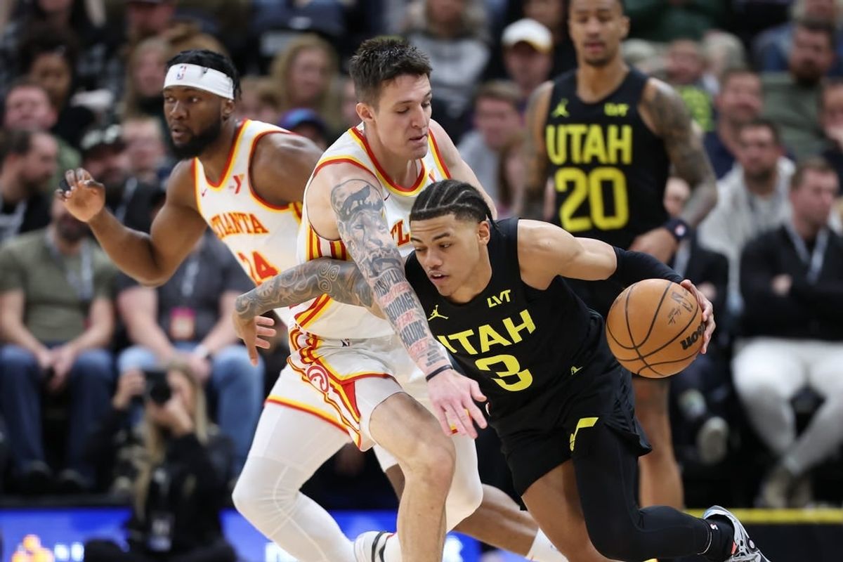 Mar 15, 2024; Salt Lake City, Utah, USA; Utah Jazz guard Keyonte George (3) drives against Atlanta Hawks guard Vit Krejci (27) during the second quarter at Delta Center.