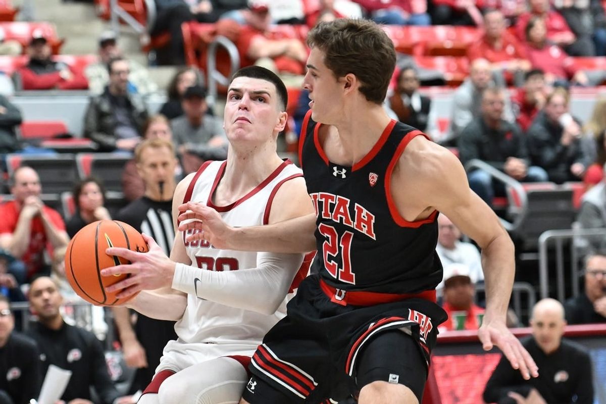 Jan 24, 2024; Pullman, Washington, USA; Washington State Cougars forward Andrej Jakimovski (23) shoots the ball against Utah Utes guard Luka Tarlac (21) in the first half at Friel Court at Beasley Coliseum.