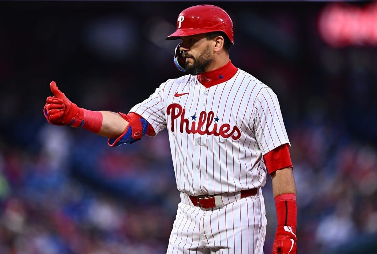 Apr 1, 2024; Philadelphia, Pennsylvania, USA; Philadelphia Phillies designated hitter Kyle Schwarber (12) reacts after hitting a single against the Cincinnati Reds in the first inning at Citizens Bank Park.