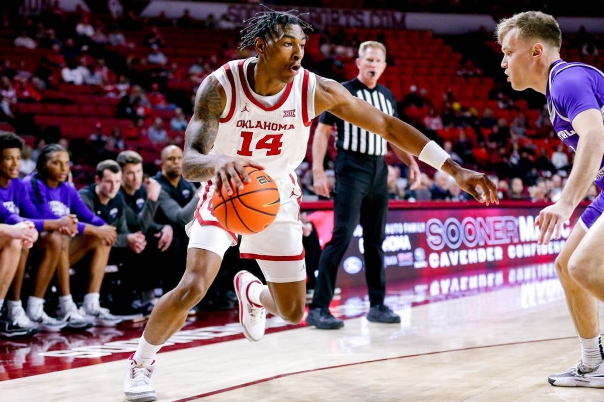 Oklahoma forward Jalon Moore (14) works toward the hoop in the first half during an NCAA game between the Oklahoma Sooners and the Central Arknasaw Bears at the Lloyd Noble Center in Norman, Okla., on Thursday, Dec. 28, 2023.