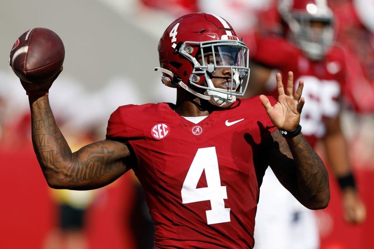 Sep 23, 2023; Tuscaloosa, Alabama, USA;  Alabama Crimson Tide quarterback Jalen Milroe (4) throws a pass against the Mississippi Rebels during the first half at Bryant-Denny Stadium.
