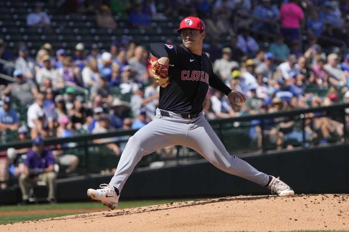 Mar 3, 2024; Mesa, Arizona, USA; Cleveland Guardians pitcher Logan Allen (41) throws against the Chicago Cubs in the first inning at Sloan Park.