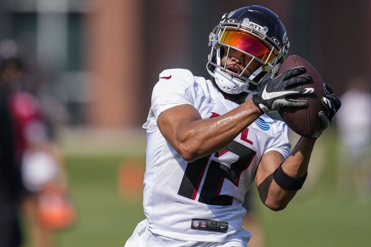 Jul 28, 2023; Flowery Branch, GA, USA; Atlanta Falcons wide receiver KhaDarel Hodge (12) catches a pass during training camp at IBM Performance Field.