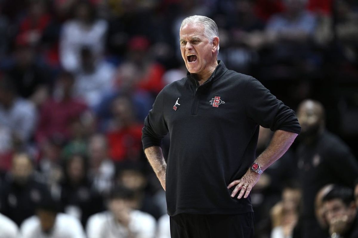 Dec 21, 2023; San Diego, California, USA; San Diego State Aztecs head coach Brian Dutcher yells out during the second half against the Stanford Cardinal at Viejas Arena.