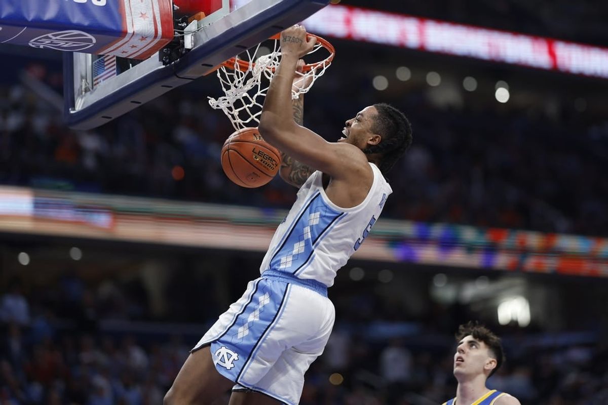 Mar 15, 2024; Washington, D.C., USA; North Carolina Tar Heels forward Armando Bacot (5) dunks the ball against the Pittsburgh Panthers in the second half at Capital One Arena.