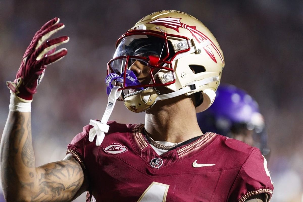 Nov 18, 2023; Tallahassee, Florida, USA; Florida State Seminoles wide receiver Keon Coleman (4) celebrates a touchdown against the North Alabama Lions during the third quarter at Doak S. Campbell Stadium.