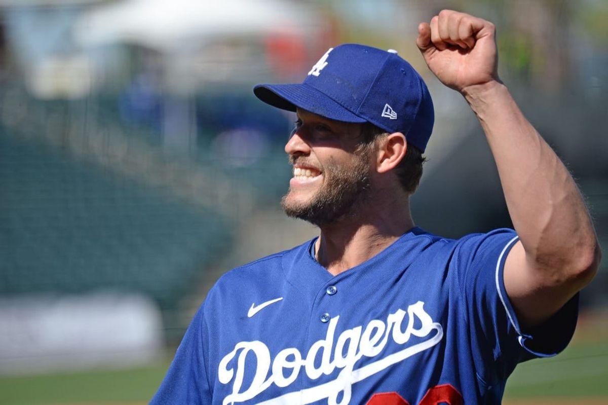 Los Angeles Dodgers starting pitcher Clayton Kershaw (22) waves to fans.
