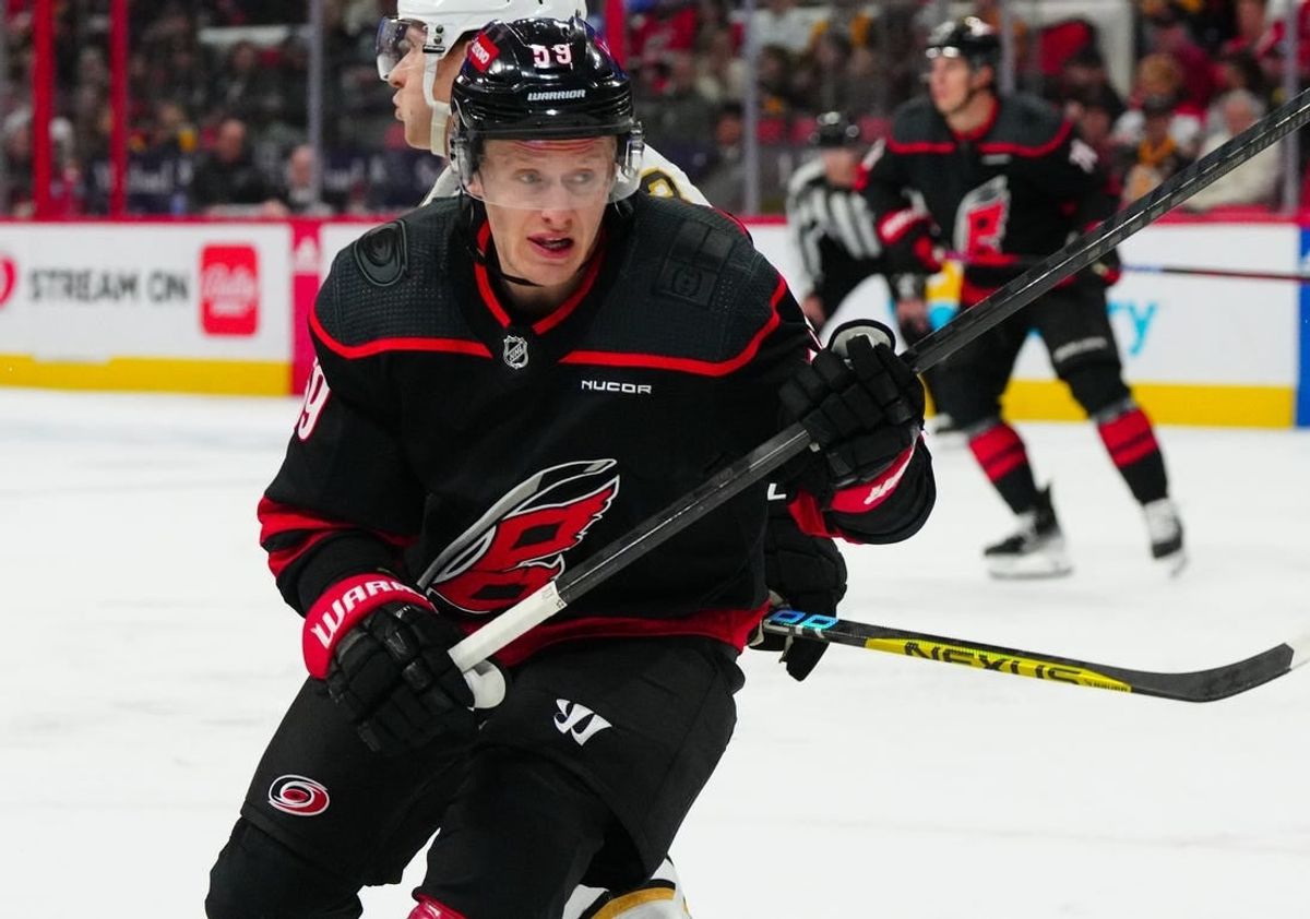 Apr 4, 2024; Raleigh, North Carolina, USA; Carolina Hurricanes left wing Jake Guentzel (59) skates against the Boston Bruins during the first period at PNC Arena.