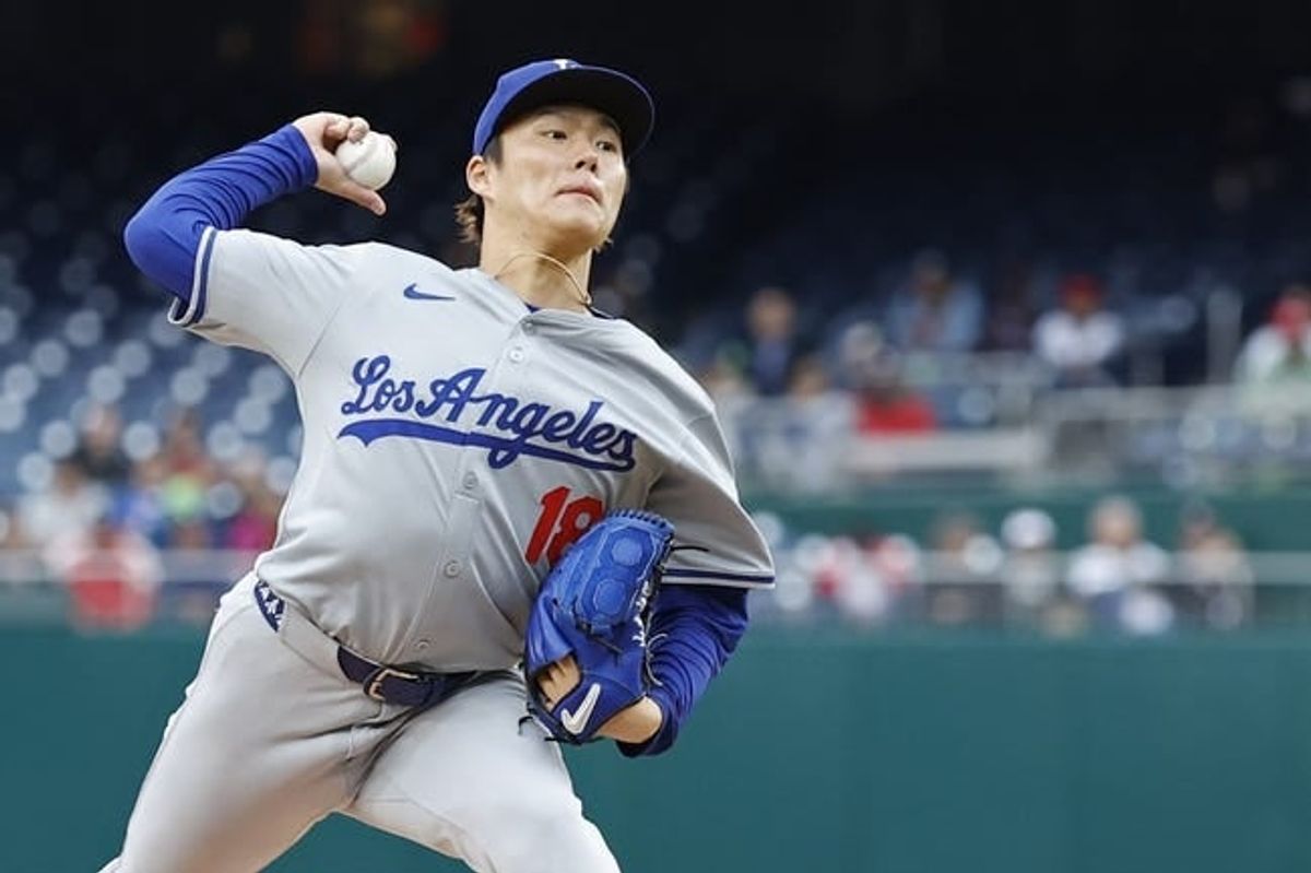 Apr 25, 2024; Washington, District of Columbia, USA; Los Angeles Dodgers starting pitcher Yoshinobu Yamamoto (18) pitches against the Washington Nationals during the second inning at Nationals Park.