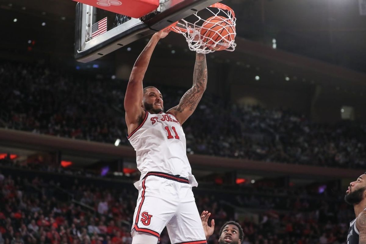 Mar 9, 2024; New York, New York, USA; St. John's Red Storm center Joel Soriano (11) dunks in the second half against the Georgetown Hoyas at Madison Square Garden.
