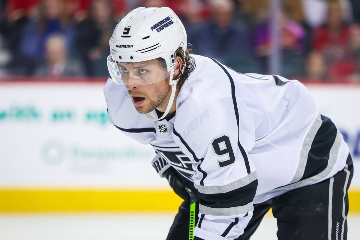 Mar 30, 2024; Calgary, Alberta, CAN; Los Angeles Kings right wing Adrian Kempe (9) during the face off against the Calgary Flames during the third period at Scotiabank Saddledome.
