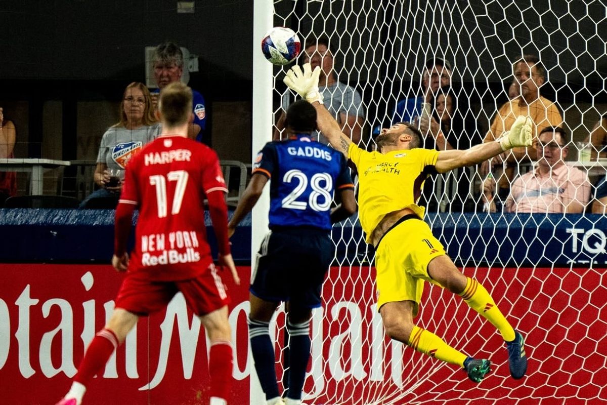 New York Red Bulls forward Elias Manoel (11) ball gets passed FC Cincinnati goalkeeper Alec Kann (1) for a goal in the first half of the MLS match between FC Cincinnati and New York Red Bulls at TQL Stadium in Cincinnati on Wednesday, Oct. 4, 2023.