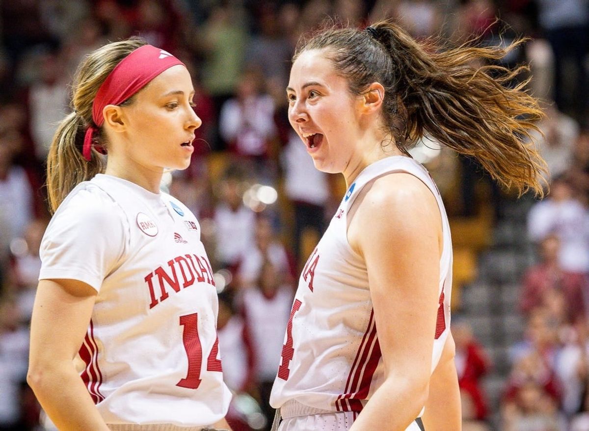 Indiana's Mackenzie Holmes (54) celebrates with Sara Scalia (14) after the fourth quarter during second round NCAA action at Simon Skjodt Assembly Hall on Monday, March 25, 2024.