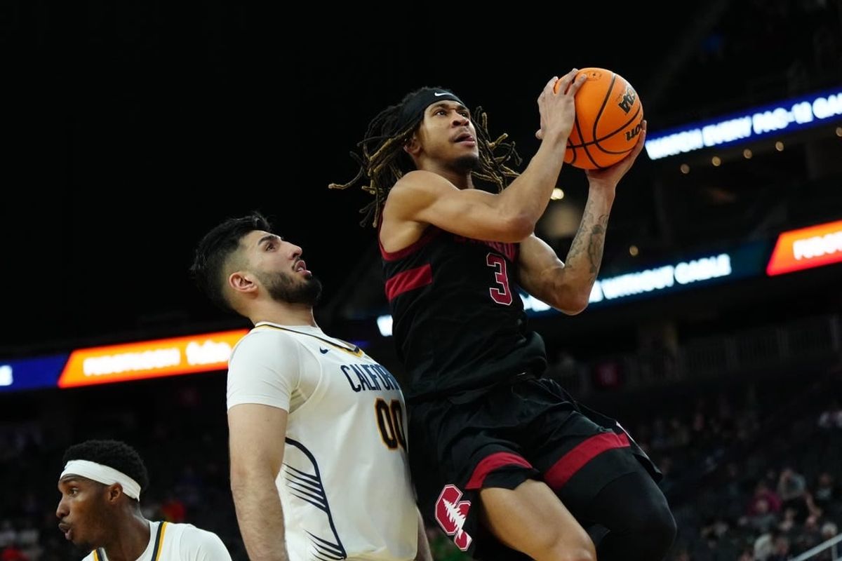 Mar 13, 2024; Las Vegas, NV, USA; Stanford Cardinal guard Kanaan Carlyle (3) shoots the ball against California Golden Bears forward Fardaws Aimaq (00) in the first half at T-Mobile Arena.