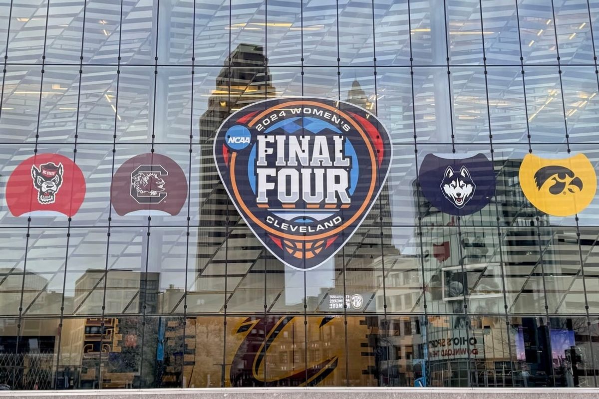 Apr 4, 2024; Cleveland, OH, USA; The NCAA Women's Final Four and team logos of the NC State Wolfpack, South Carolina Gamecocks, UConn Huskies and Iowa Hawkeyes at Rocket Mortgage FieldHouse.