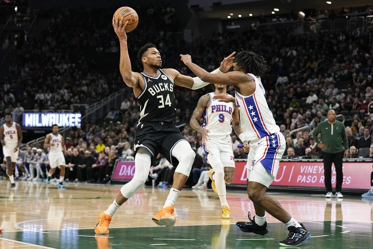 Mar 14, 2024; Milwaukee, Wisconsin, USA;  Milwaukee Bucks forward Giannis Antetokounmpo (34) drives for the basket during the first quarter against the Philadelphia 76ers at Fiserv Forum.