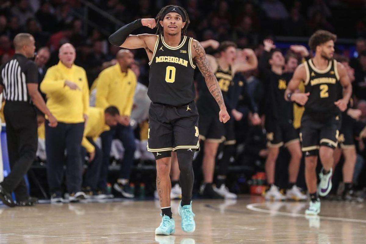 Nov 13, 2023; New York, New York, USA; Michigan Wolverines guard Dug McDaniel (0) celebrates in the second half against the St. John's Red Storm at Madison Square Garden.