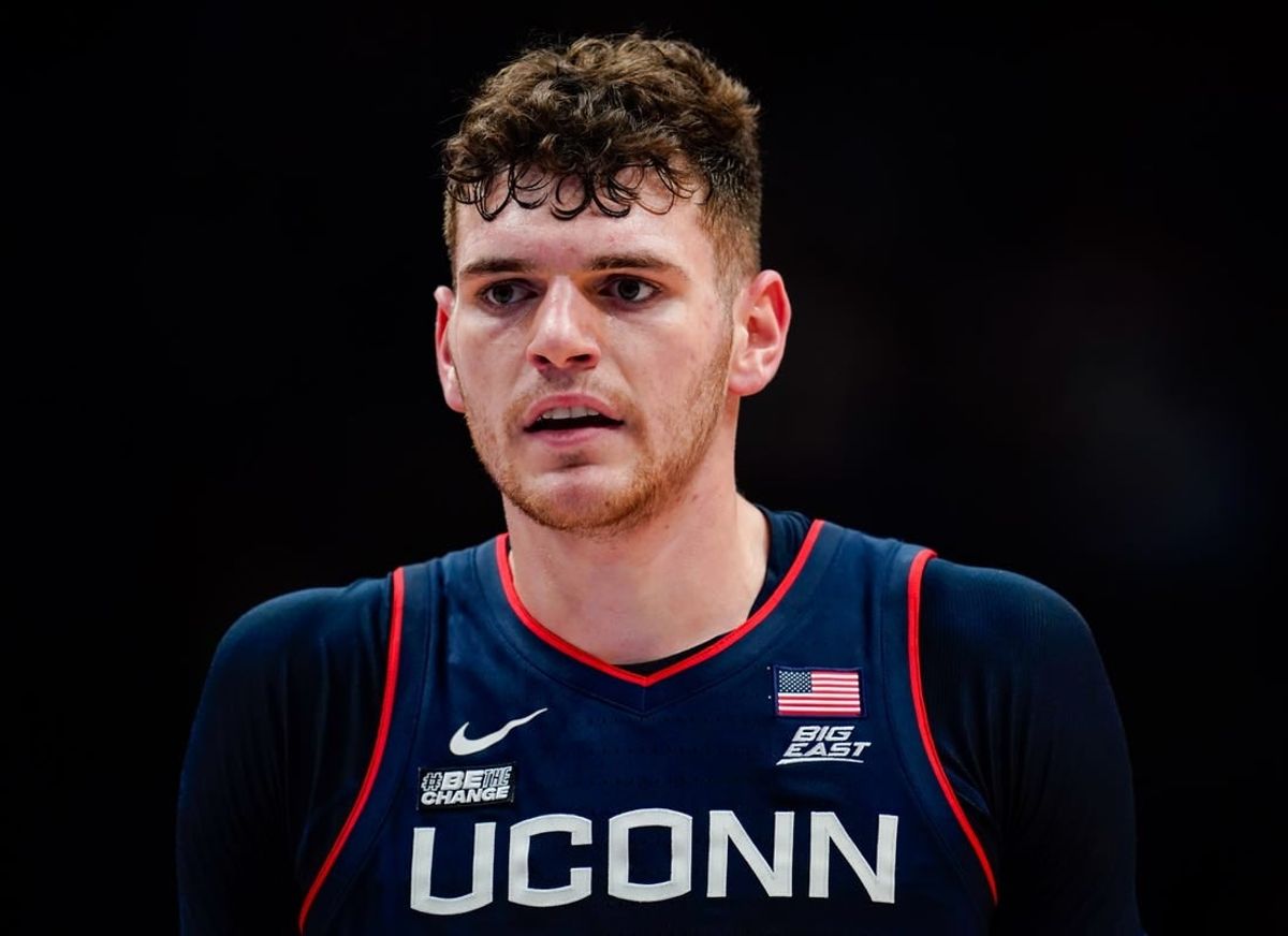 Dec 1, 2023; Lawrence, Kansas, USA; Connecticut Huskies center Donovan Clingan (32) during the first half against the Kansas Jayhawks at Allen Fieldhouse.