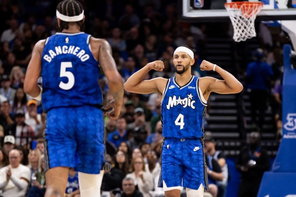 Nov 11, 2023; Orlando, Florida, USA; Orlando Magic guard Jalen Suggs (4) gestures towards Orlando Magic forward Paolo Banchero (5) during the first half against the Milwaukee Bucks at Amway Center.