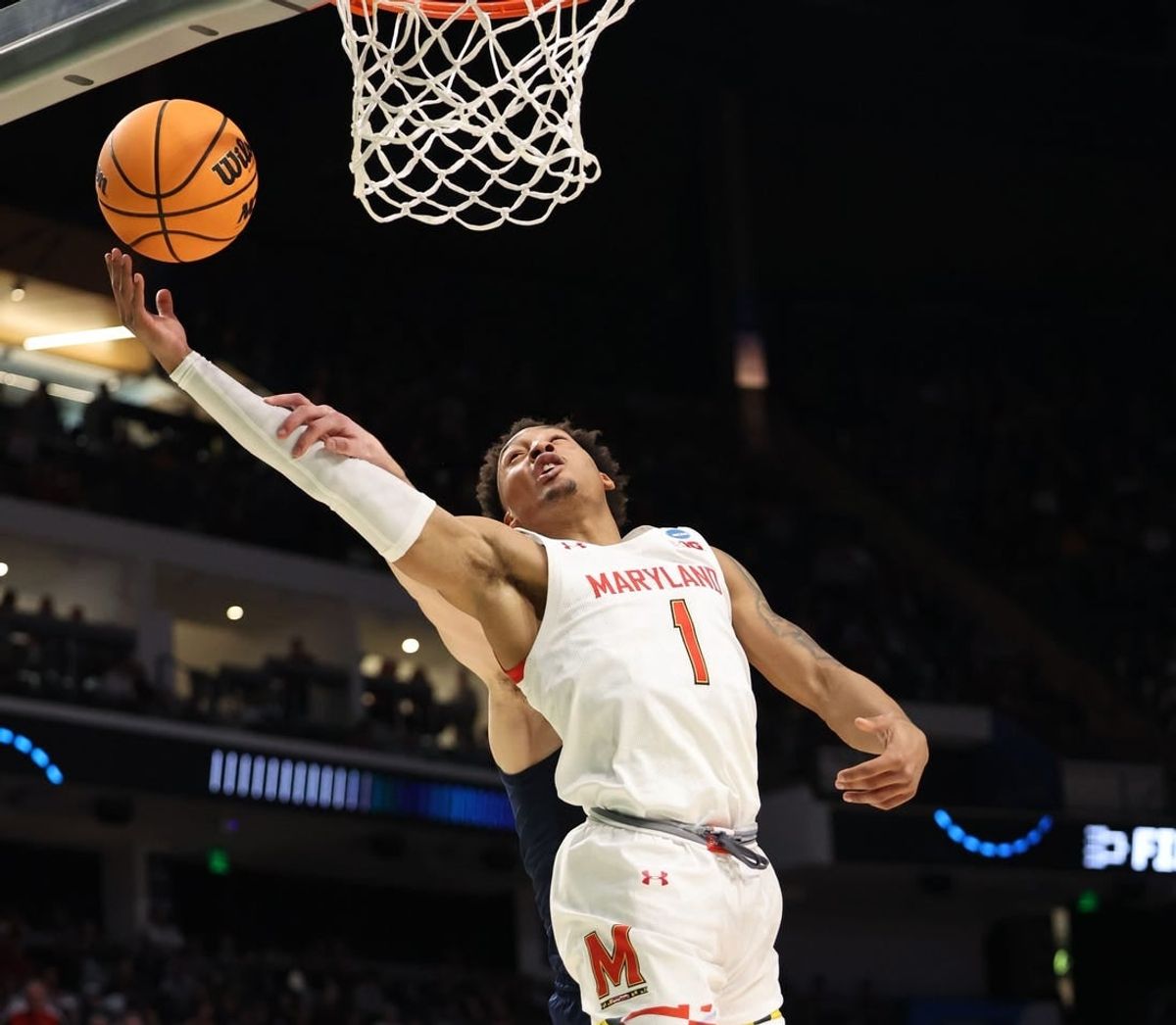 Mar 16, 2023; Birmingham, AL, USA; Maryland Terrapins guard Jahmir Young (1) reaches back for a rebound against the West Virginia Mountaineers during the first half in the first round of the 2023 NCAA Tournament at Legacy Arena.