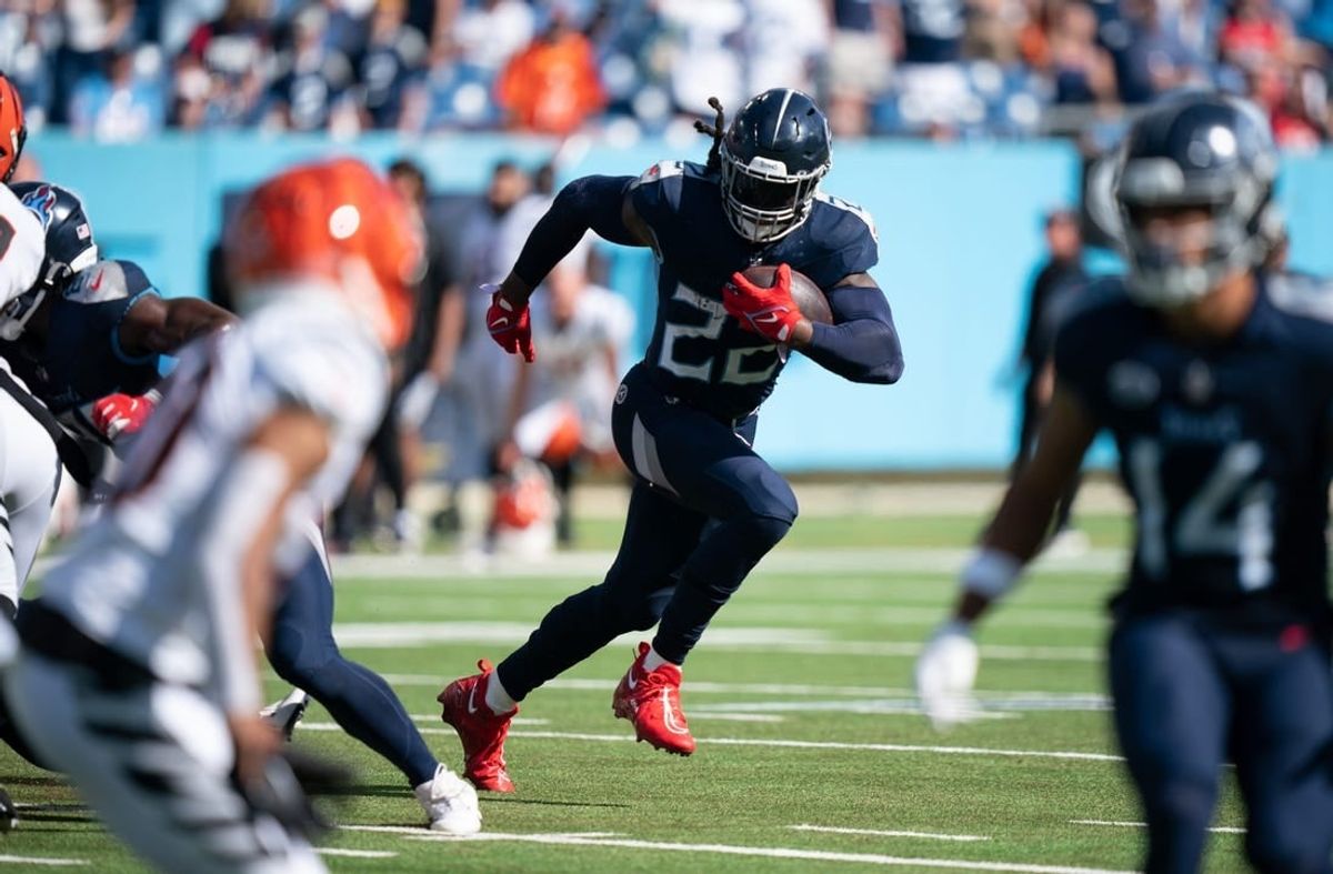 Tennessee Titans running back Derrick Henry (22) breaks off a big run against the Cincinnati Bengals in the final minutes at Nissan Stadium in Nashville, Tenn., Sunday, Oct. 1, 2023.