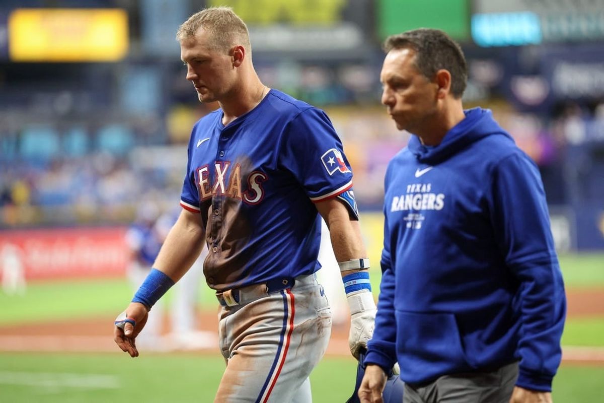 Apr 1, 2024; St. Petersburg, Florida, USA;  Texas Rangers third baseman Josh Jung (6) leaves the game against the Tampa Bay Rays in the ninth inning at Tropicana Field.