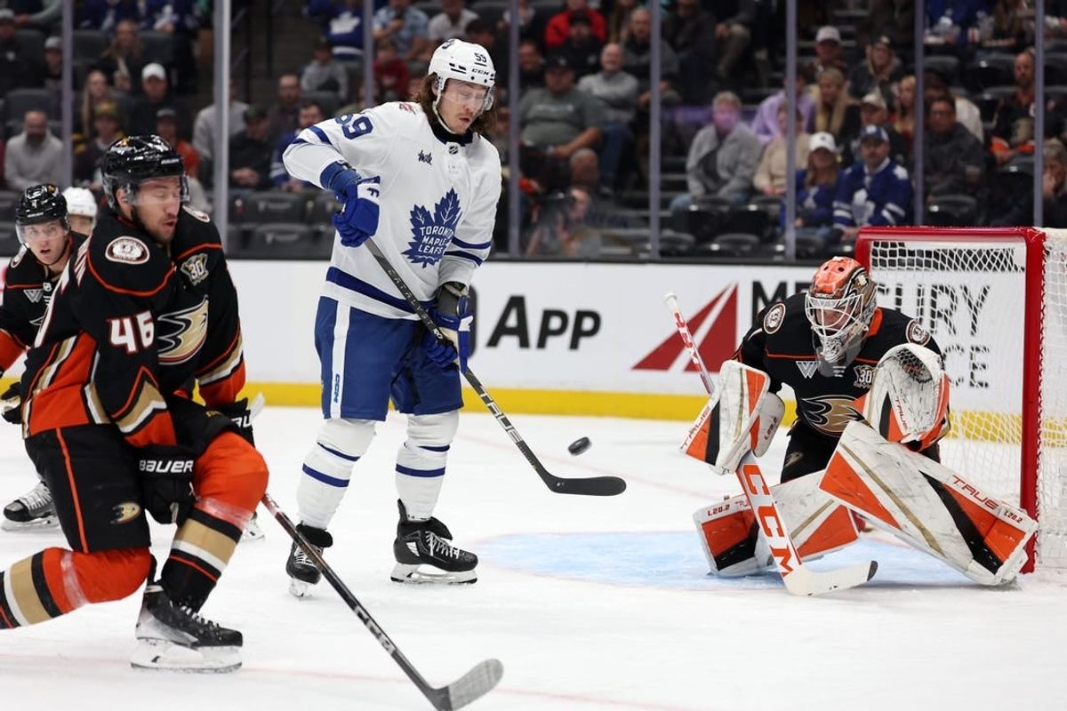 Jan 3, 2024; Anaheim, California, USA; Anaheim Ducks goaltender Lukas Dostal (1) blocks a shot  during the first period against the Toronto Maple Leafs at Honda Center.
