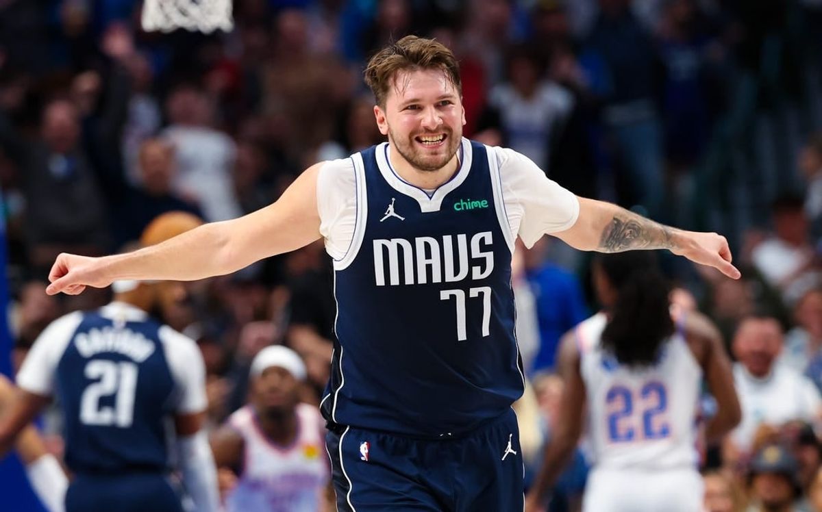 Feb 10, 2024; Dallas, Texas, USA; Dallas Mavericks guard Luka Doncic (77) reacts during the first half against the Oklahoma City Thunder at American Airlines Center.