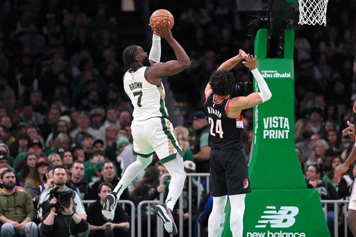 Apr 7, 2024; Boston, Massachusetts, USA; Boston Celtics guard Jaylen Brown (7) shoots the ball against the Portland Trail Blazers during the first half at TD Garden.