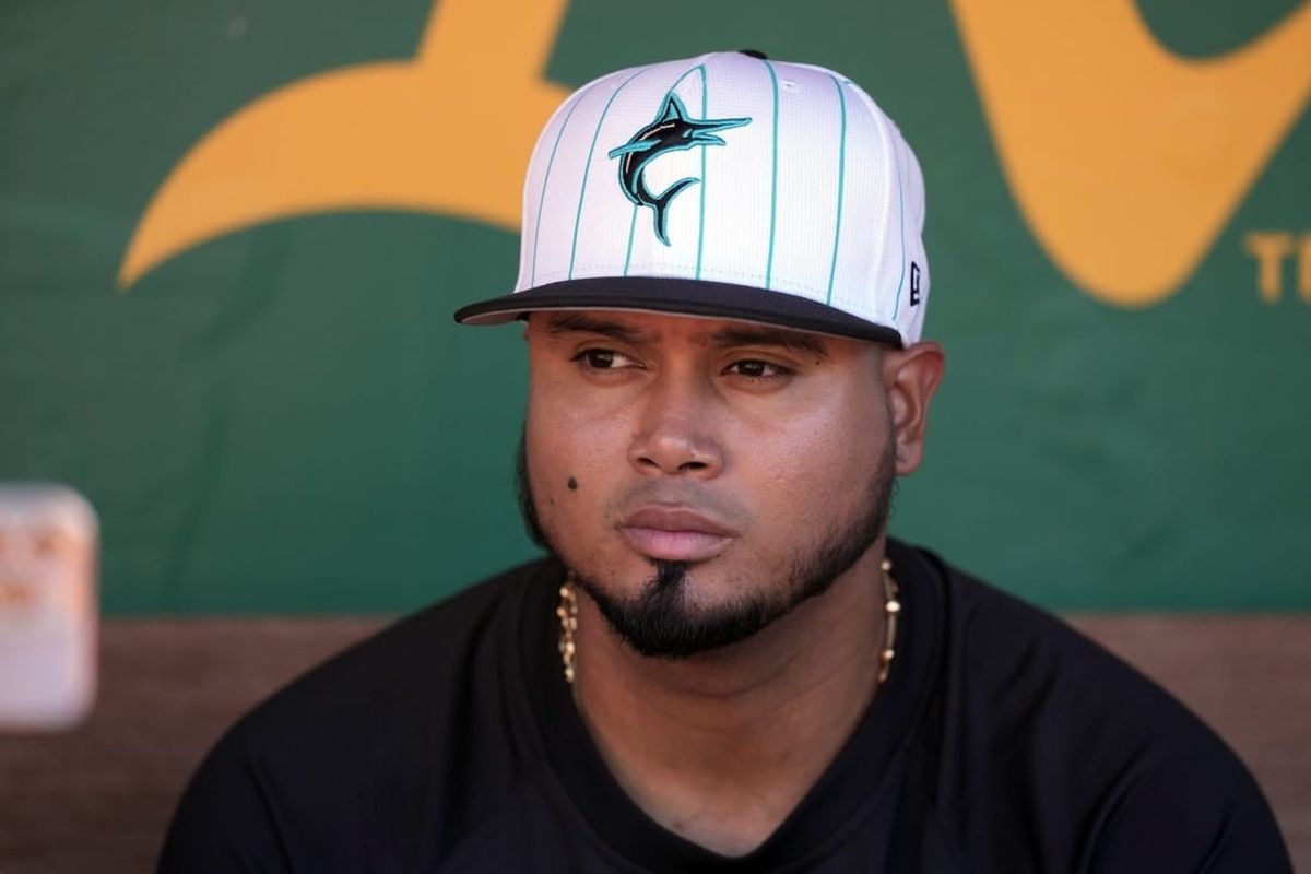 May 3, 2024; Oakland, California, USA; Miami Marlins second baseman Luis Arraez (3) sits in the dugout before the game against the Oakland Athletics at Oakland-Alameda County Coliseum.