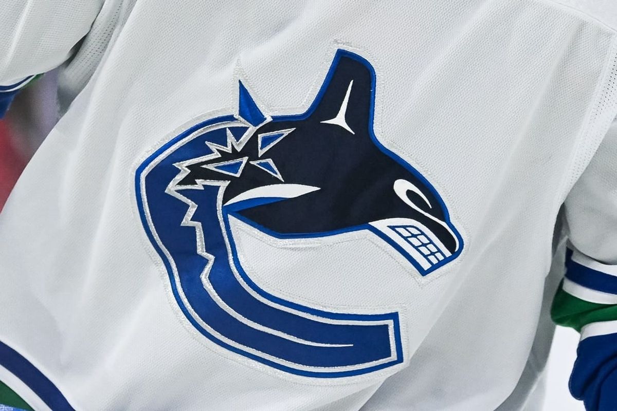 Nov 12, 2023; Montreal, Quebec, CAN; View of a Vancouver Canucks logo on a jersey worn by a member of the team against the Montreal Canadiens during the second period at Bell Centre.