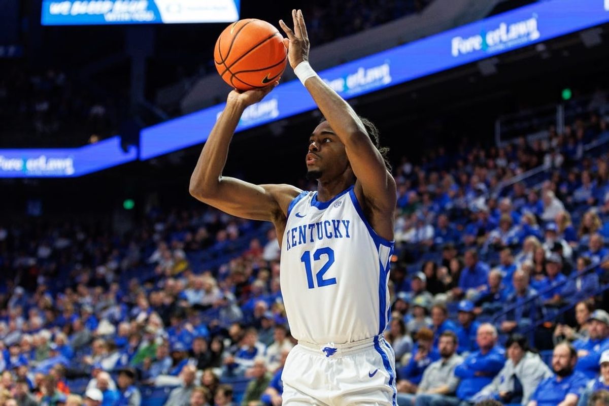 Nov 10, 2023; Lexington, Kentucky, USA; Kentucky Wildcats guard Antonio Reeves (12) shoots the ball during the second half against the Texas A&M Commerce Lions at Rupp Arena at Central Bank Center.