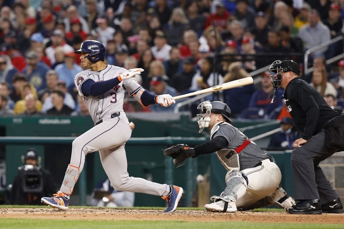 Apr 19, 2024; Washington, District of Columbia, USA; Houston Astros shortstop Jeremy Pena (3) singles against the Washington Nationals during the third inning at Nationals Park.