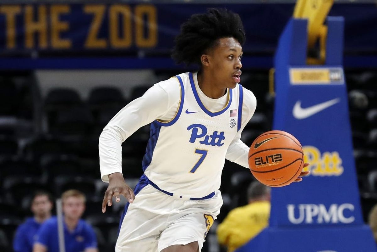 Dec 20, 2023; Pittsburgh, Pennsylvania, USA; Pittsburgh Panthers guard Carlton Carrington (7) dribbles up court on a fast break against the IPFW Mastodons during the first half at the Petersen Events Center.