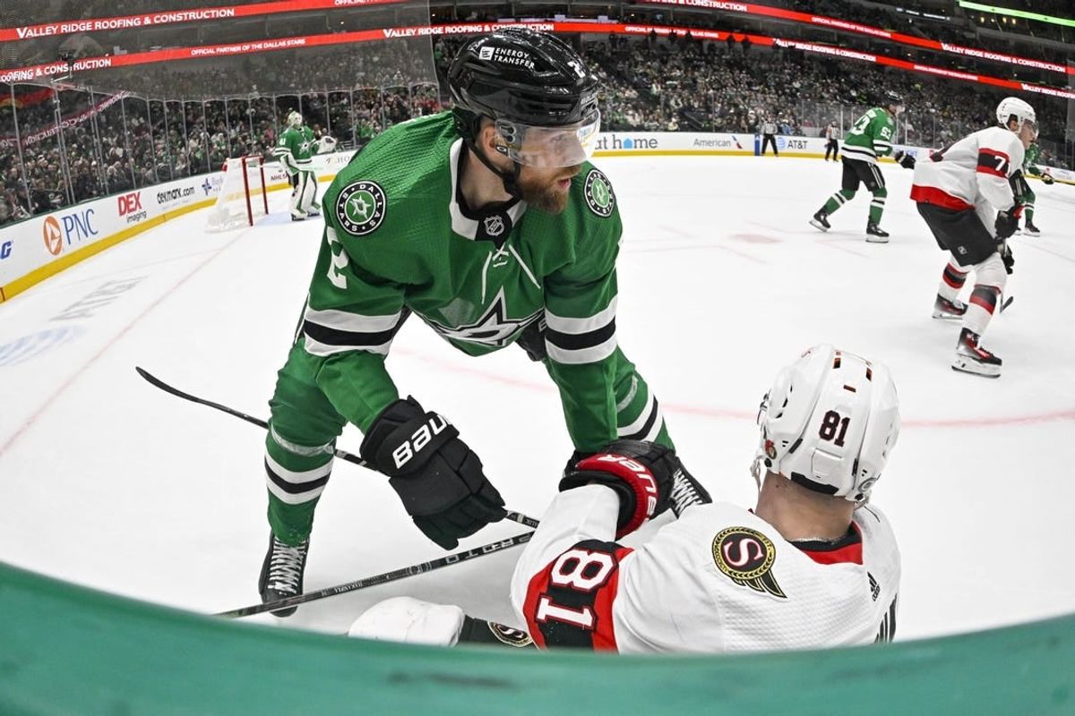 Dec 15, 2023; Dallas, Texas, USA; Dallas Stars defenseman Jani Hakanpaa (2) checks Ottawa Senators left wing Dominik Kubalik (81) during the second period at the American Airlines Center.