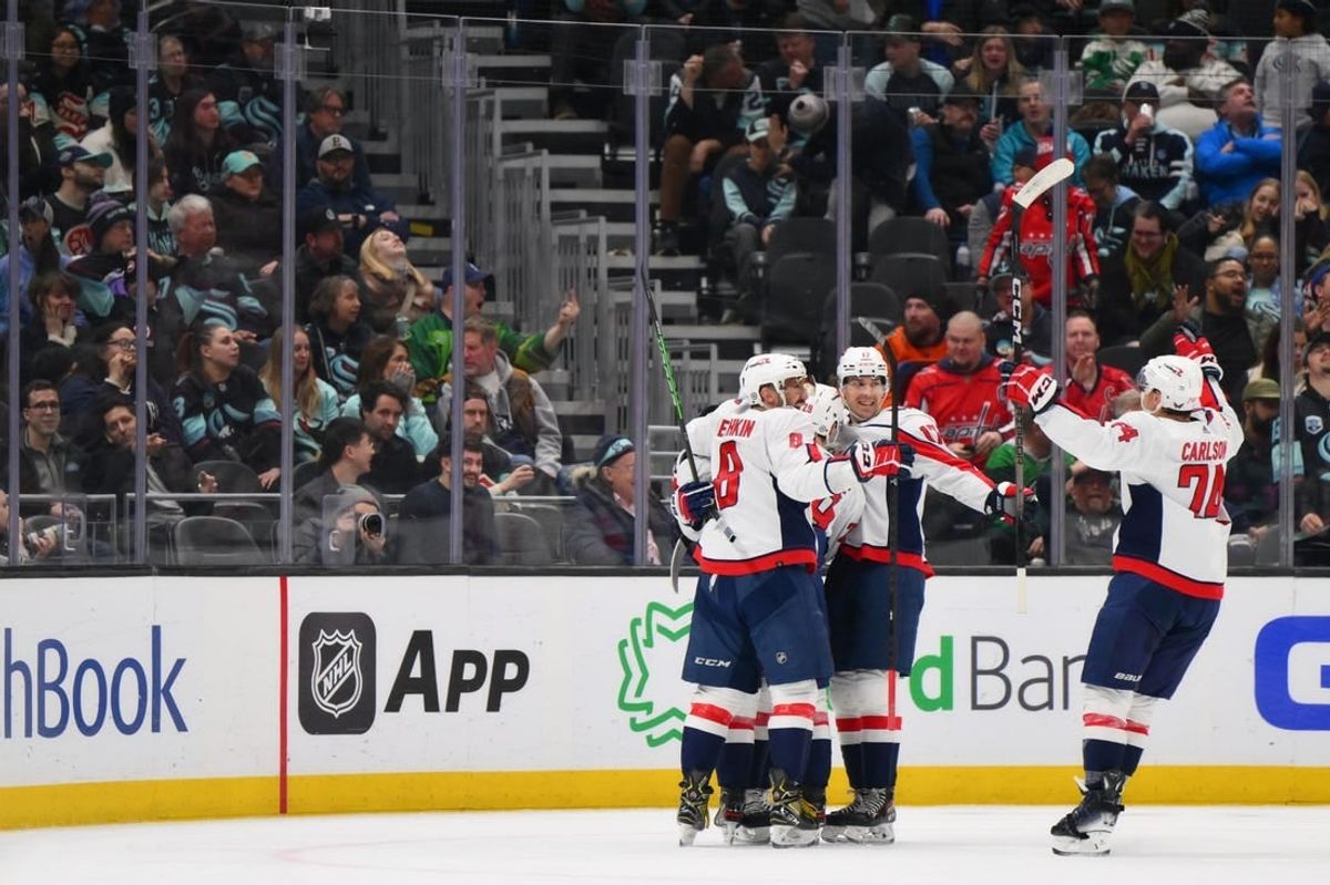 Mar 14, 2024; Seattle, Washington, USA; The Washington Capitals celebrate after a goal scored by right wing T.J. Oshie (77) against the Seattle Kraken during the second period at Climate Pledge Arena.