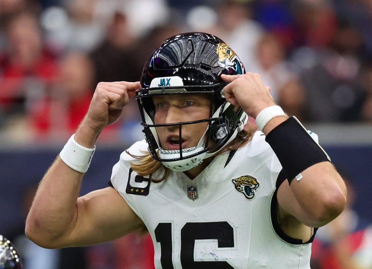 Nov 26, 2023; Houston, Texas, USA;  Jacksonville Jaguars quarterback Trevor Lawrence (16) calls an audible against the Houston Texans at NRG Stadium.