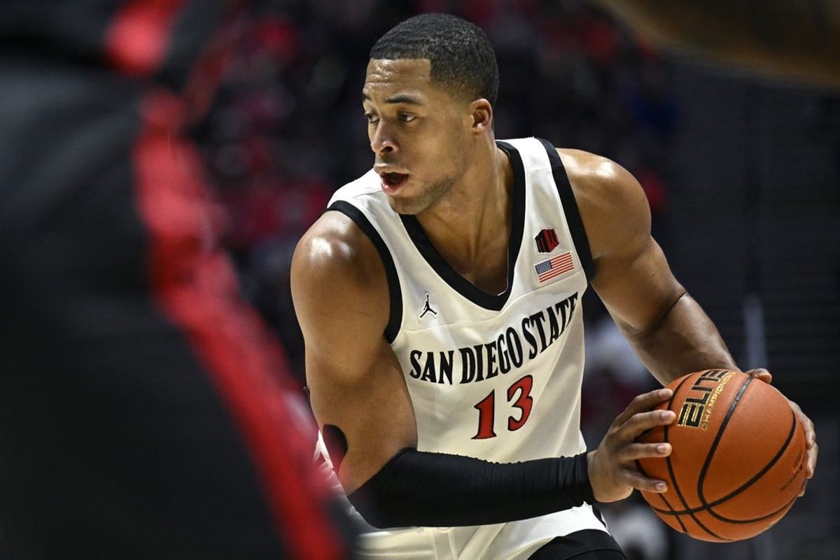 Jan 6, 2024; San Diego, California, USA; San Diego State Aztecs forward Jaedon LeDee (13) controls the ball during the first half against the UNLV Rebels at Viejas Arena.