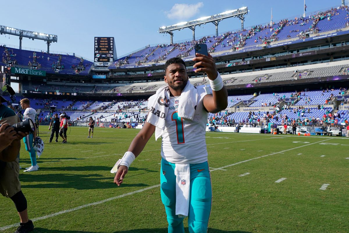 Tua takes a selfie or perhaps a quick Facetime after a  memorable fourth-quarter performance.