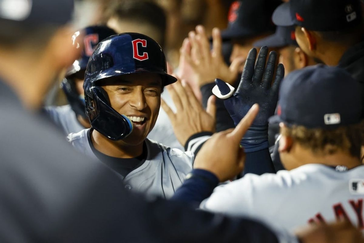Apr 2, 2024; Seattle, Washington, USA; Cleveland Guardians designated hitter Bo Naylor (23) celebrates in the dugout after hitting a two-run home run against the Seattle Mariners during the fourth inning at T-Mobile Park.