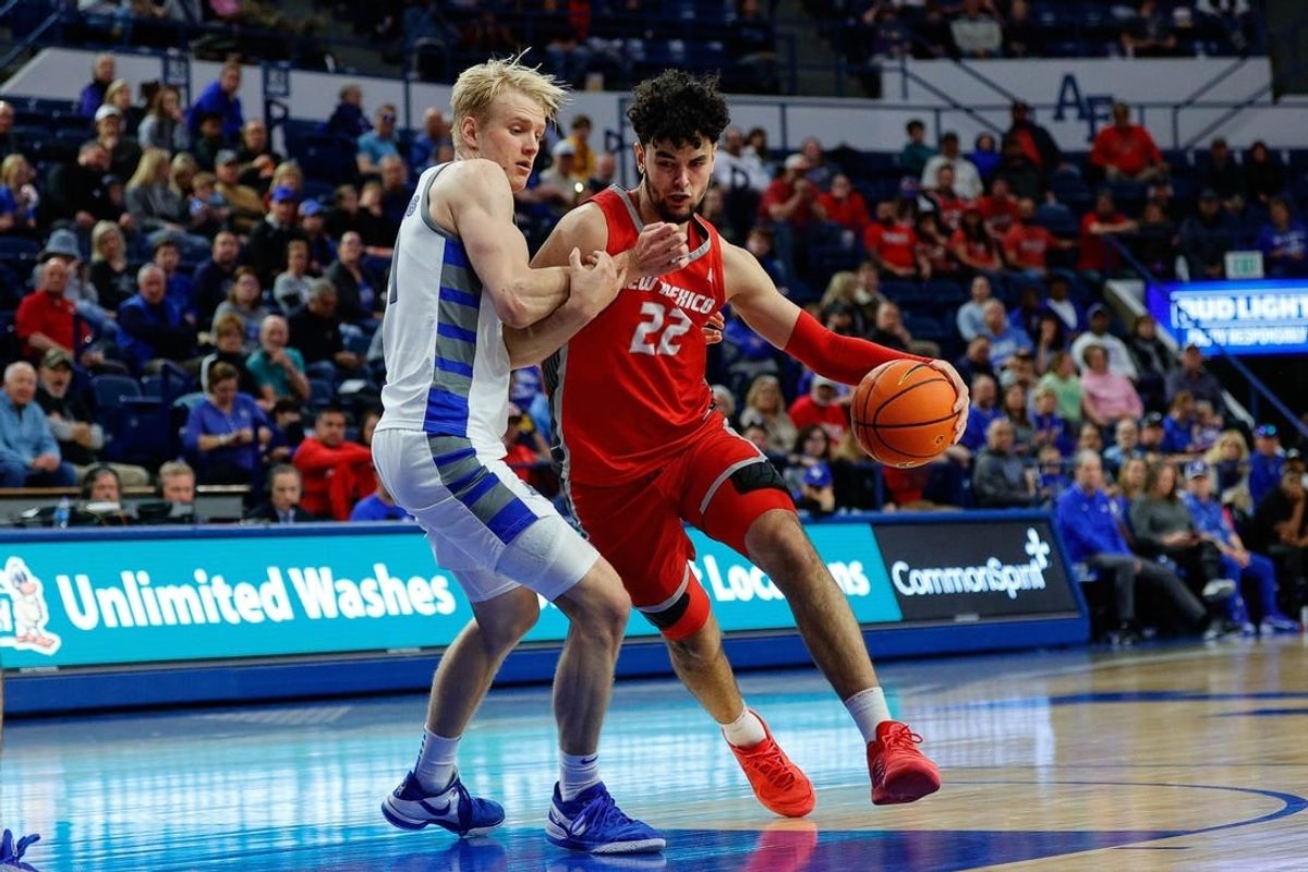 Jan 20, 2024; Colorado Springs, Colorado, USA; New Mexico Lobos forward Mustapha Amzil (22) drives to the basket against Air Force Falcons forward Rytis Petraitis (31) in the second half at Clune Arena.
