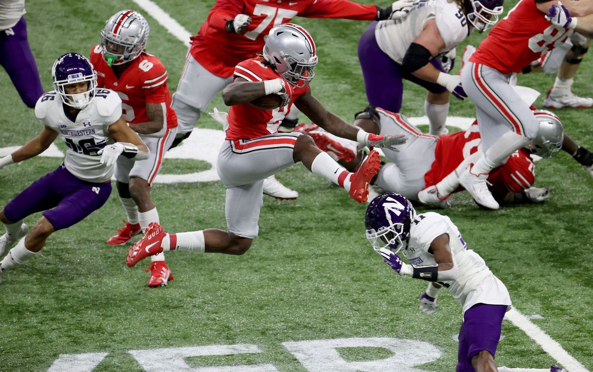 Trey Sermo n rushed for 331 yards as Ohio State beat  Northwestern.