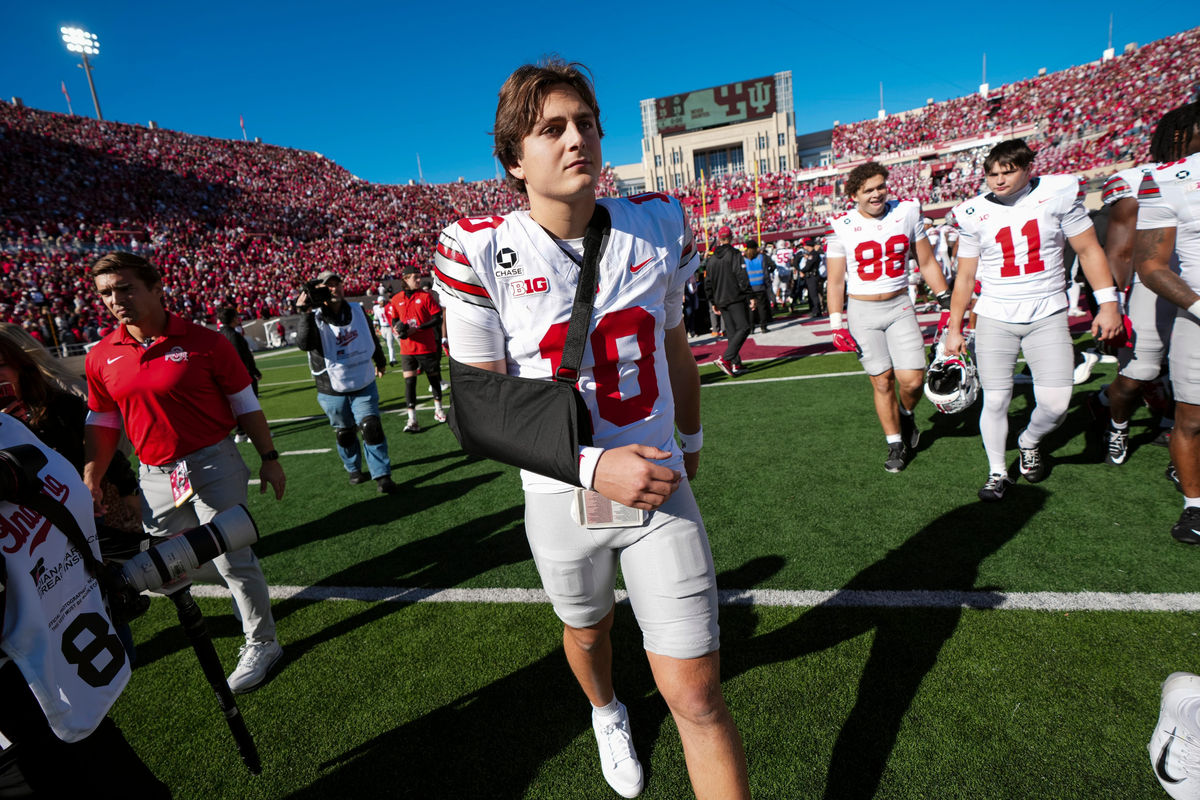 Ohio State Buckeyes quarterback Julian Sayin (10) leaves the field in a sling following the 19-15 win over the Indiana Hoosiers in the NCAA football game at Memorial Stadium Stadium in Bloomington, Ind. on Oct. 17, 2026.