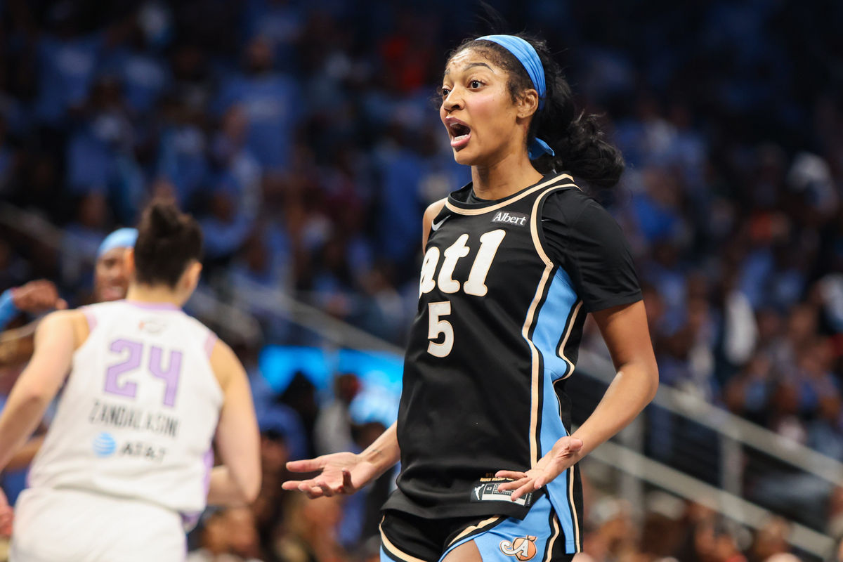Oct 21, 2026; Atlanta, Georgia, USA; Atlanta Dream forward Angel Reese (5) reacts after a basket against the Golden State Valkyries in the second quarter during game three of the 2026 WNBA Finals at State Farm Arena. Mandatory Credit: Brett Davis-Imagn Images