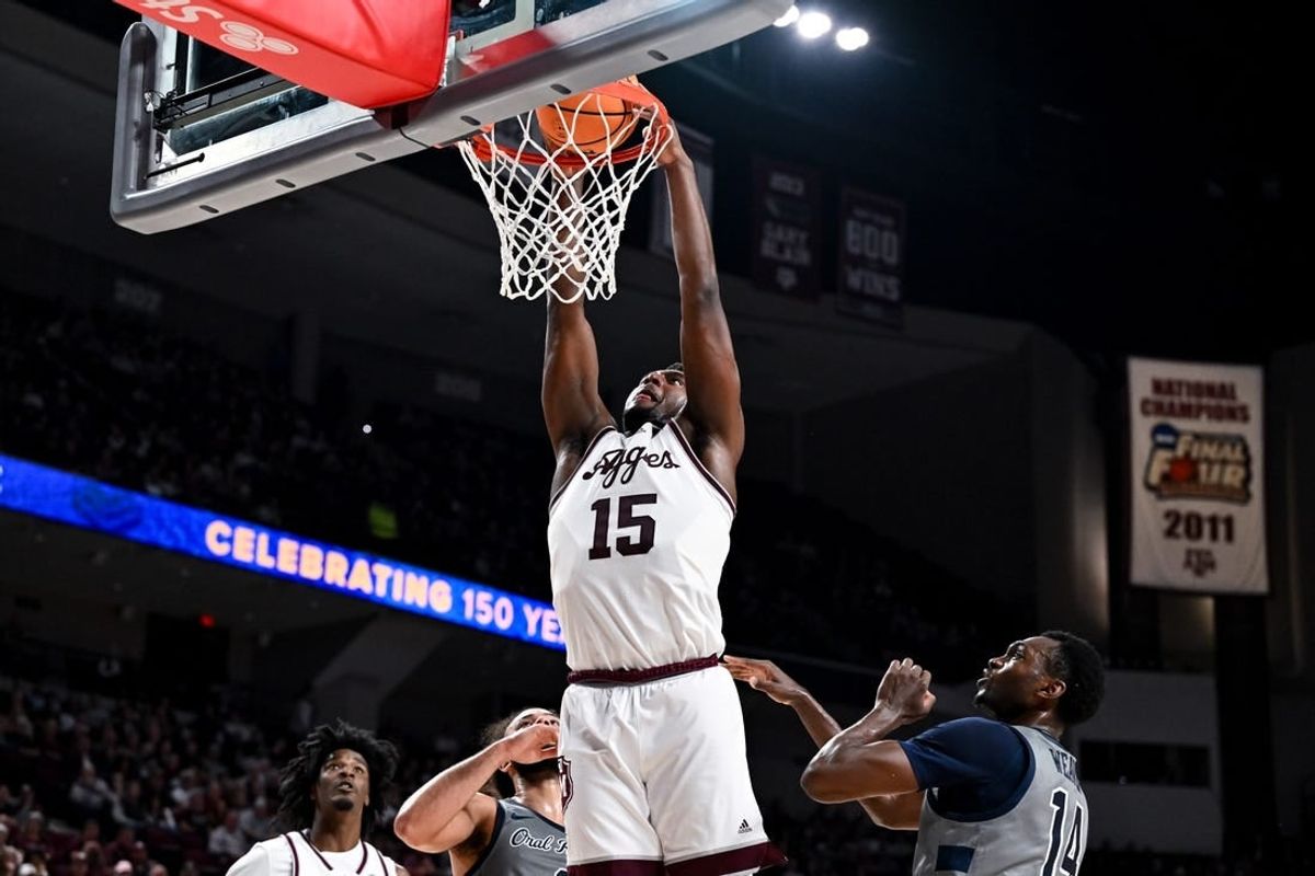 Nov 17, 2023; College Station, Texas, USA;  Texas A&M Aggies forward Henry Coleman III (15) dunks the ball during the first half against the Oral Roberts Golden Eagles at Reed Arena.