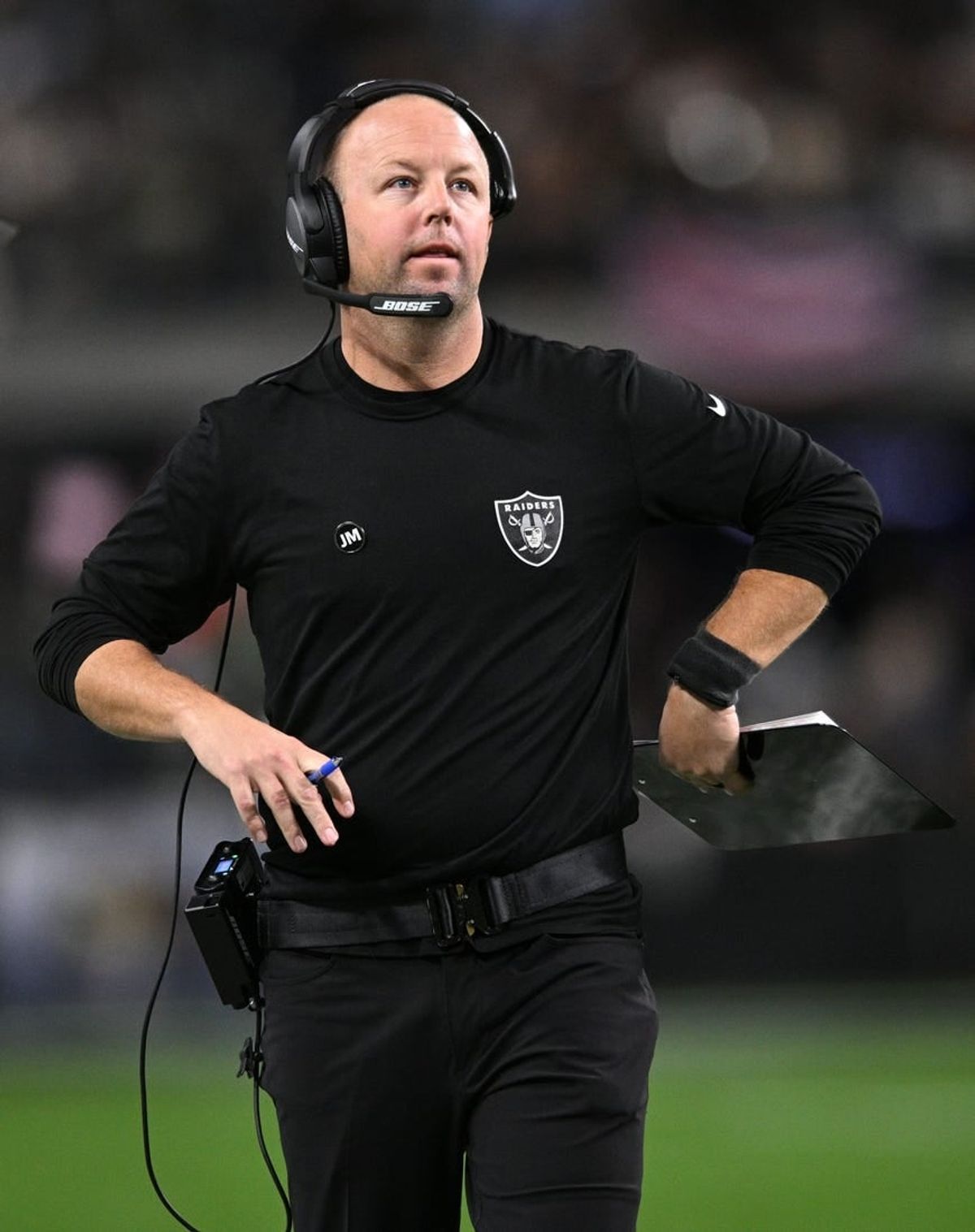 Jan 9, 2022; Paradise, Nevada, USA; Las Vegas Raiders assistant wide receivers coach Nick Holz looks on during the first half against the Los Angeles Chargers at Allegiant Stadium.